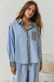 Pyjama set blue striped with checkered details close-up front view