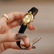 Horloge, gouden wijzerplaat, zwarte leren band, Dames