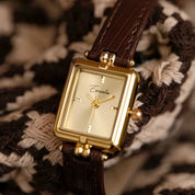Horloge, gouden wijzerplaat, zwarte leren band, Dames