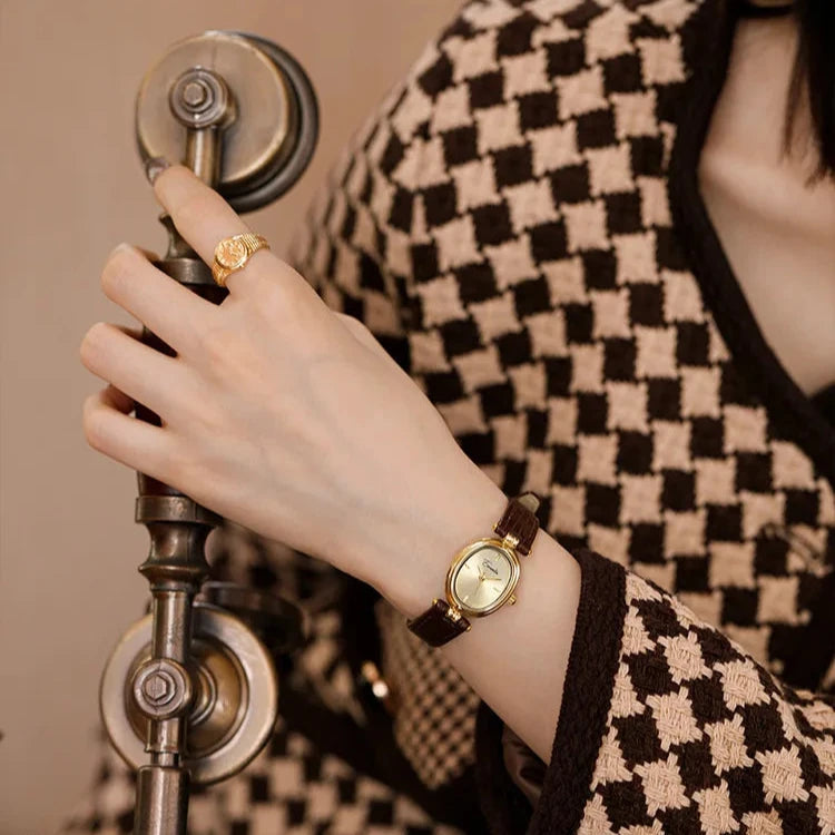 Horloge, gouden wijzerplaat, zwarte leren band, Dames