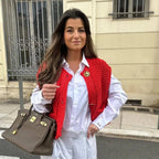 Red chunky knit vest with gold buttons front view