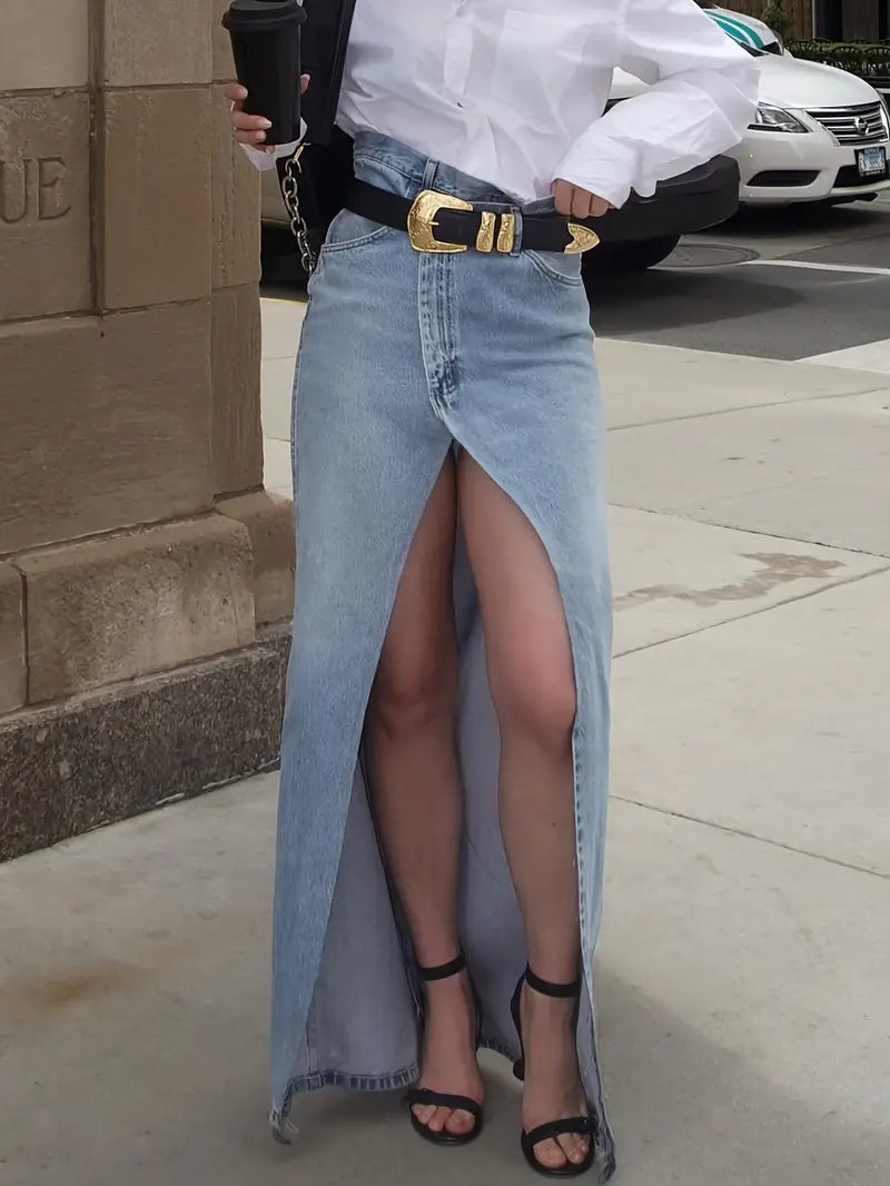 Light blue denim maxi skirt with high slit, street style front view