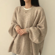Trui beige met ronde hals en bolmouwen, front view