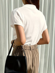 White draped-neck top with clean back design back view