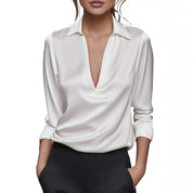 White blouse with deep V-neck close-up