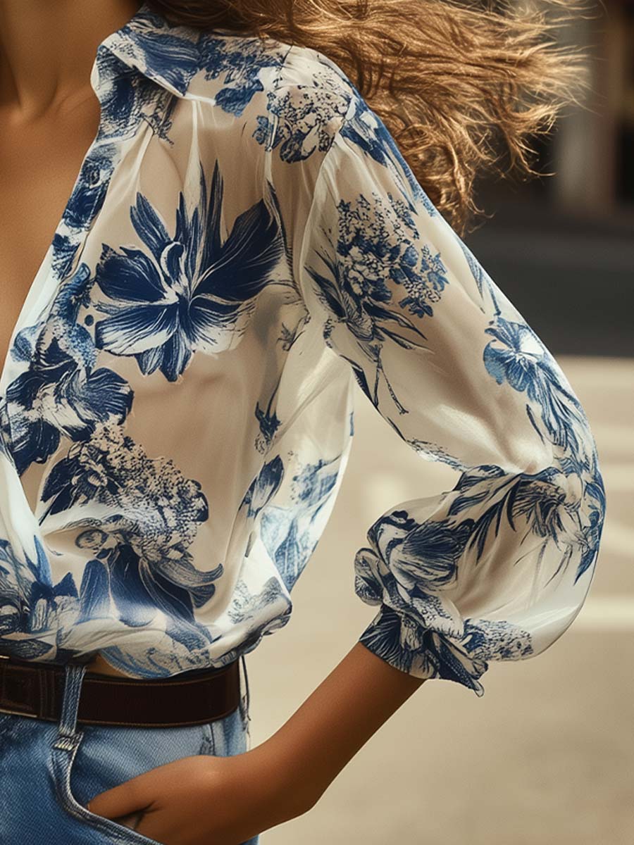 Blouse with blue floral print close-up detail
