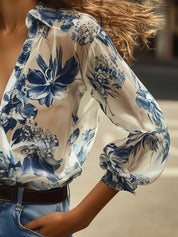 Blouse with blue floral print close-up detail