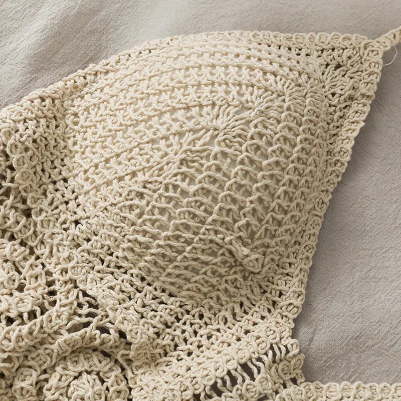 Cream crochet halter top with tassels, side detail shot