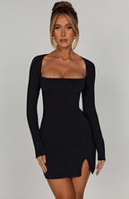 Black mini dress with square neckline and front side slit, front view