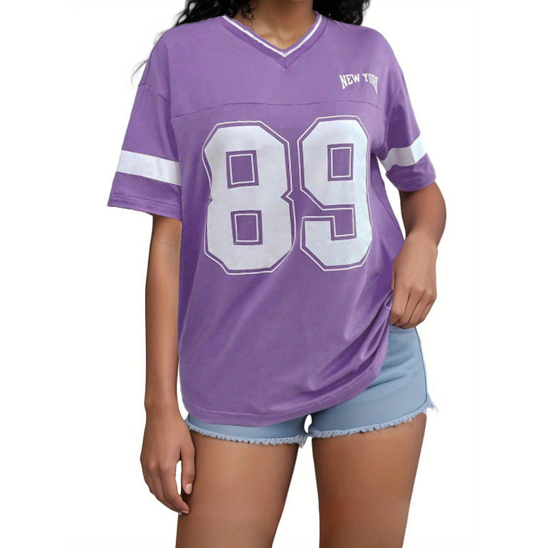 Purple v-neck t-shirt with '89' and 'New York' graphic, front view