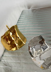 Gold and silver hair cuffs with hammered organic texture, side-by-side view
