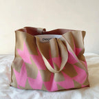 Shopper bag beige with pink and brown geometric pattern front view