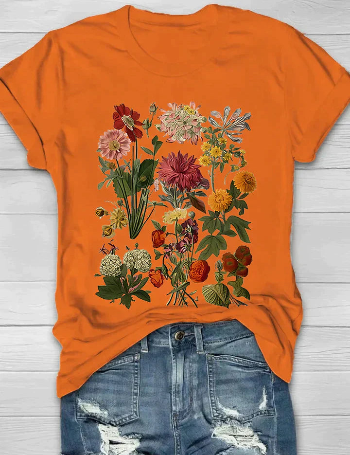 T-shirt oranje met bloemenprint vooraanzicht