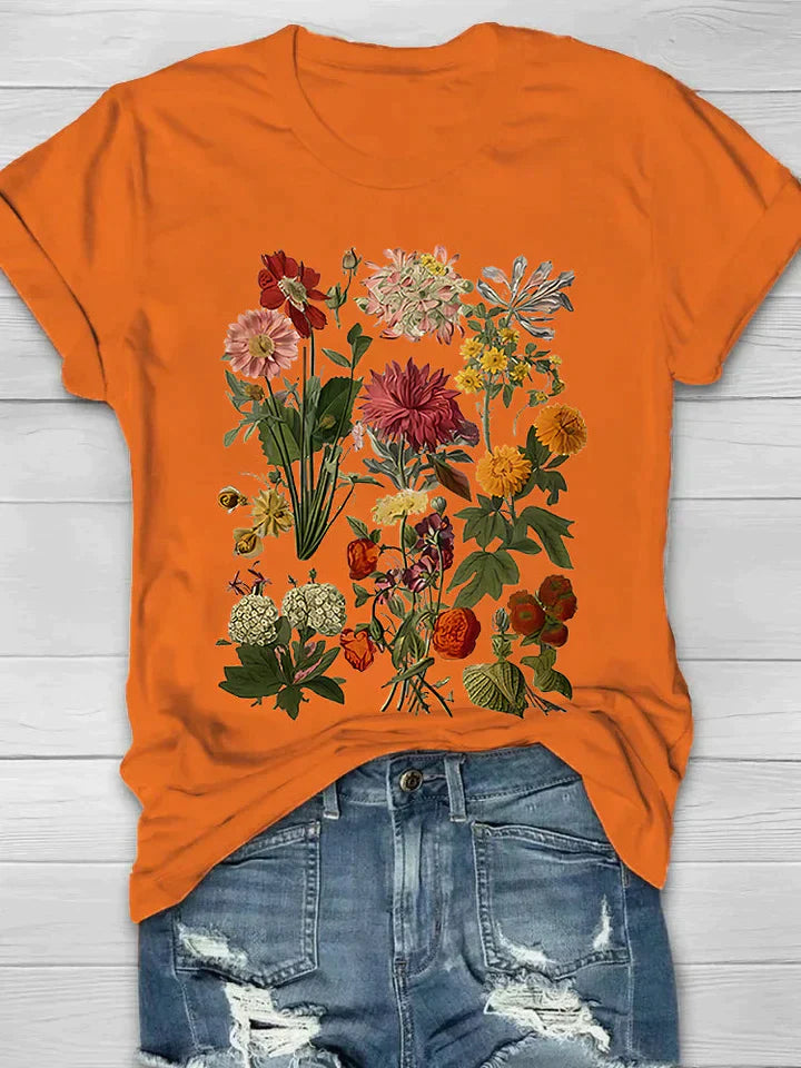 T-shirt oranje met bloemenprint vooraanzicht