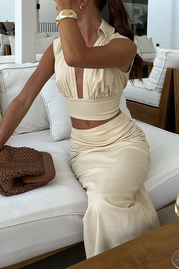 Beige ruched maxi skirt and crop top seated side view