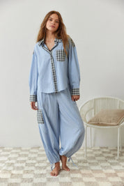 Pyjama set blue striped with checkered details front view on model