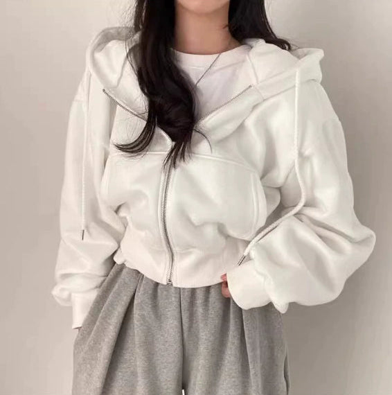 White zip-up hoodie with hood worn front view