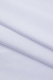 White long-sleeve crop top fabric close-up