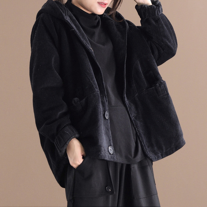 Brown corduroy hooded jacket with large pockets close-up detail