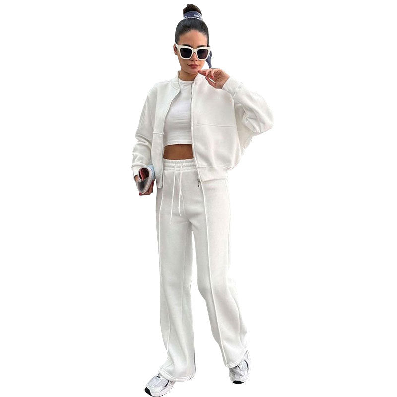White cropped bomber jacket and wide-leg pants front view