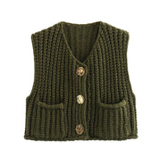 Green chunky knit vest with gold buttons front view
