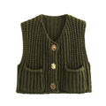 Green chunky knit vest with gold buttons front view