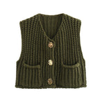 Green chunky knit vest with gold buttons front view