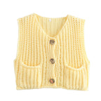 Yellow chunky knit vest with gold buttons front view