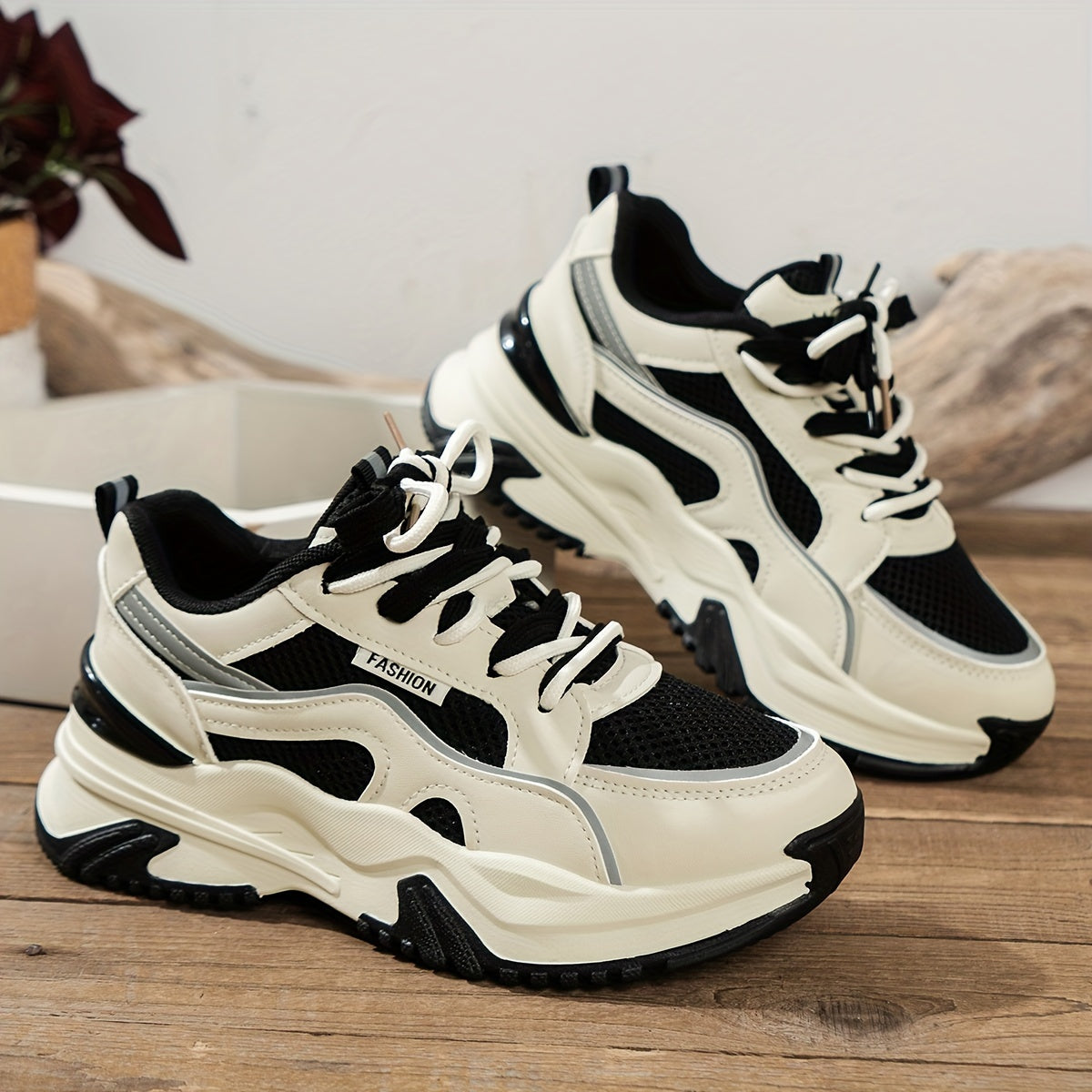 Sportieve sneakers wit met zwart en grijs detail shot