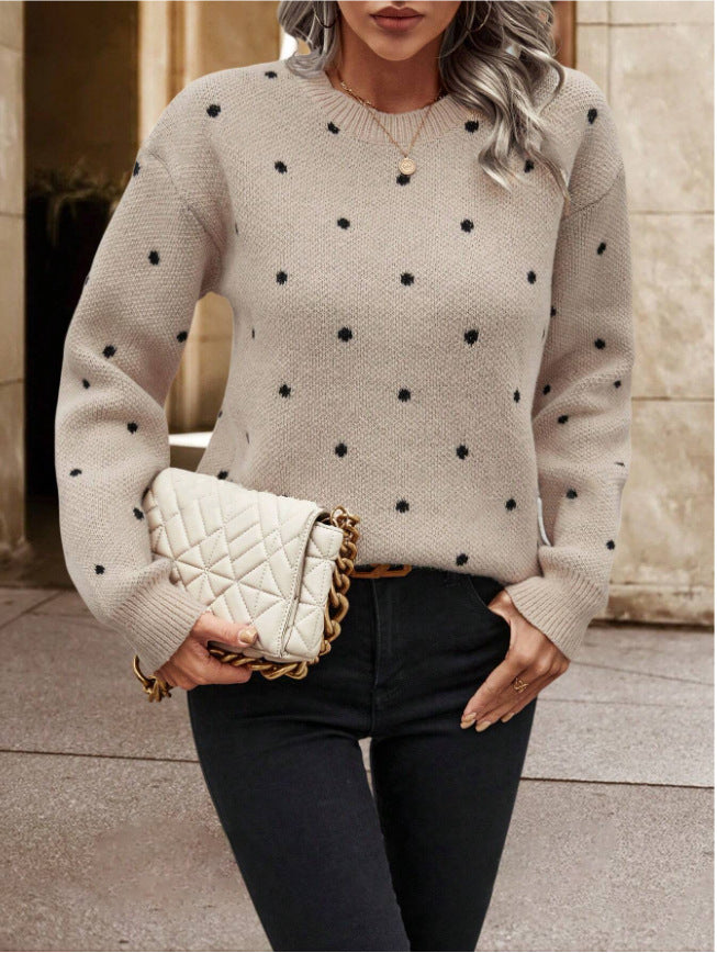 Beige knit sweater with black polka dots front view
