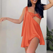 Orange asymmetrical draped dress side view