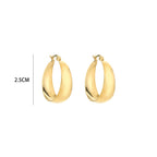 Gold hoop earrings with curved shape, front view with size indicator