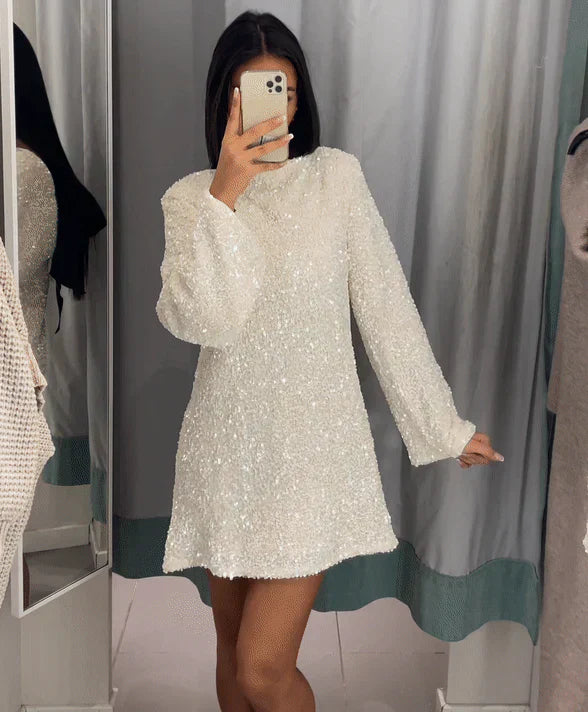 White sequin dress with black bow front view