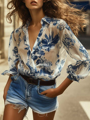 Blouse with blue floral print front view