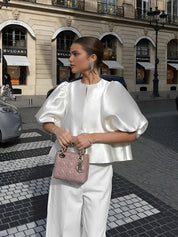 White silk blouse with puffed sleeves and matching pants side view