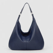 Schoudertas blauw leer detailschot