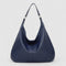 Schoudertas blauw leer detailschot