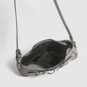 Shoulder bag gray with silver buckles open interior view