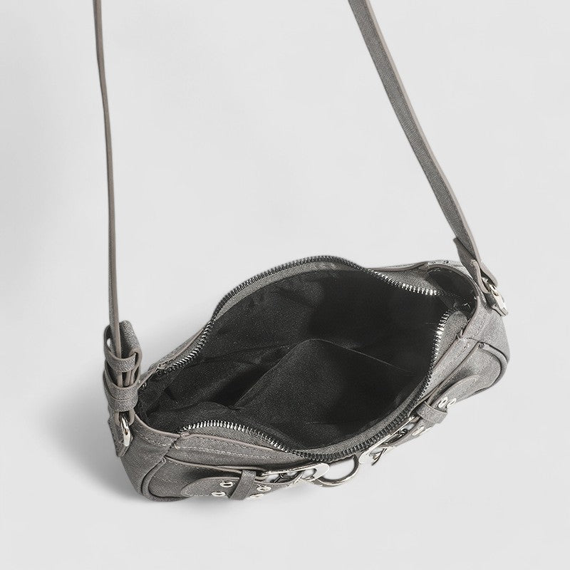 Shoulder bag gray with silver buckles open interior view