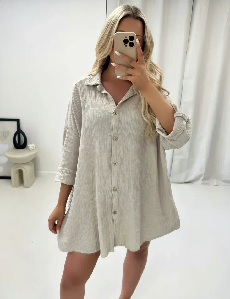 Oversized shirt with sequin eye detail, cream color, front view with buttons
