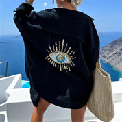 Oversized shirt with sequin eye detail, black, front view
