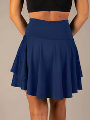 Tennisrokje met geïntegreerde short blauw achterzijde