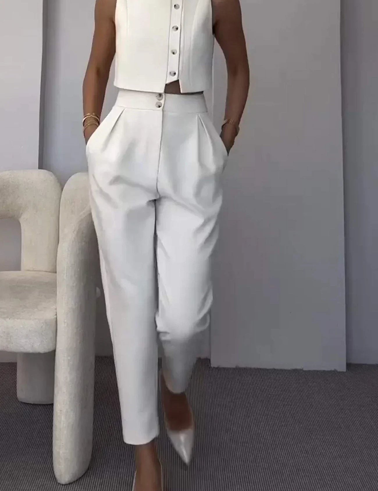 White co-ord set with heels front view