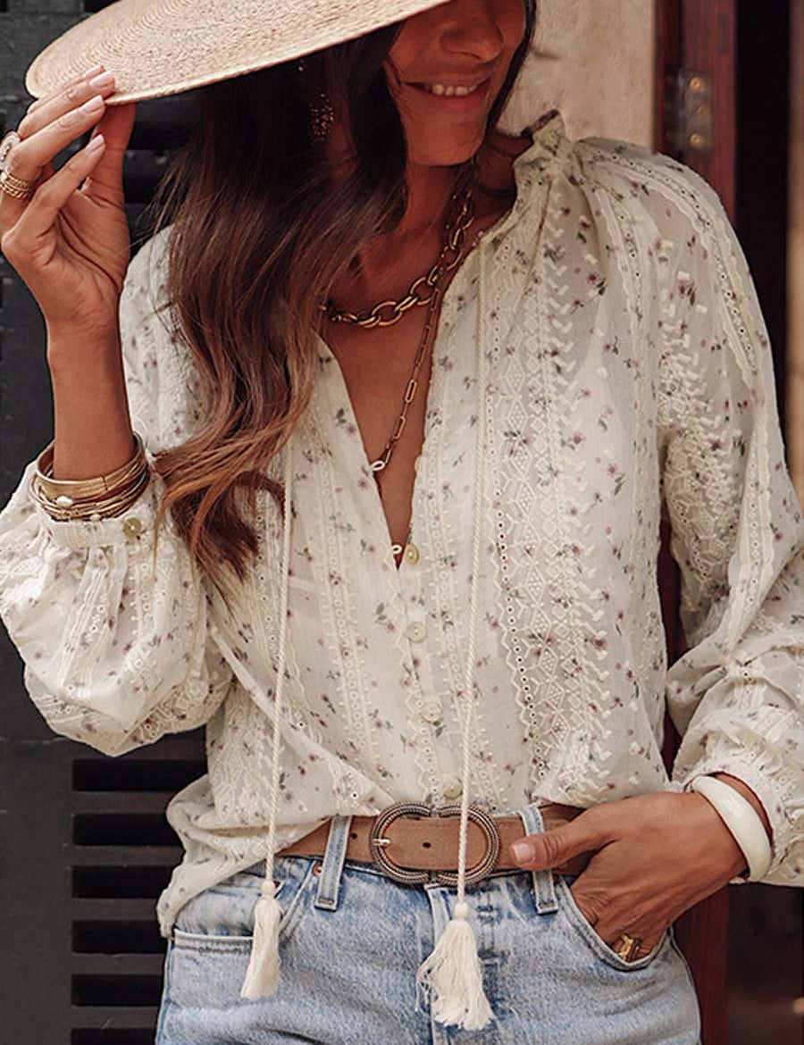 White lace blouse with floral pattern and tassel ties front view with accessories