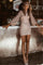 Dames jurk met glitter roze lange mouwen lifestyle shot