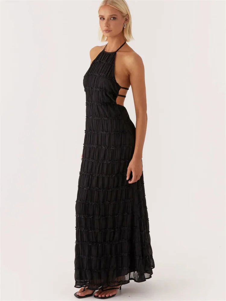 Elegante zwarte maxi-jurk met open rug en plooien, front view