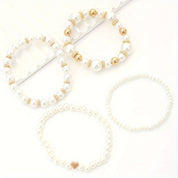 Armband set met imitatieparels en goudkleurige details, open lay-out