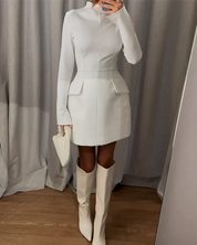 White structured dress with hept flap details, front view