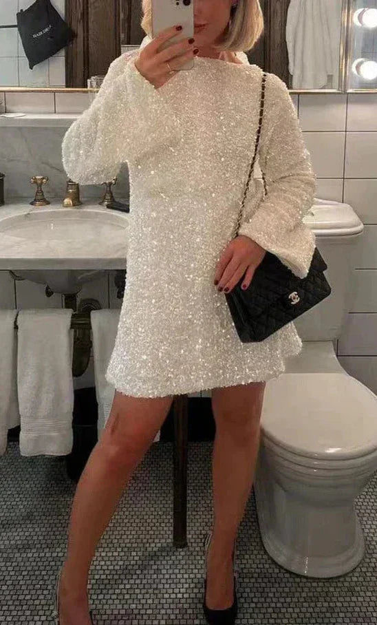 White sequin dress with black bow full body front view