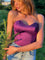 Purple corset top with sweetheart neckline outdoor close-up